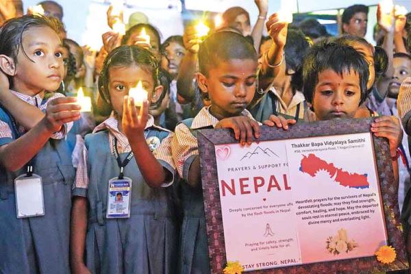 Tibetans, Nepalis worry, pray for kin